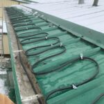 Gutter, downspout and roof zig zag heat trace trace_ snow melting system installed in Salt Lake City Utah.